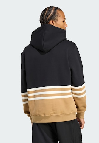ADIDAS ORIGINALS Collegepaita 'Archive Cutline' värissä musta