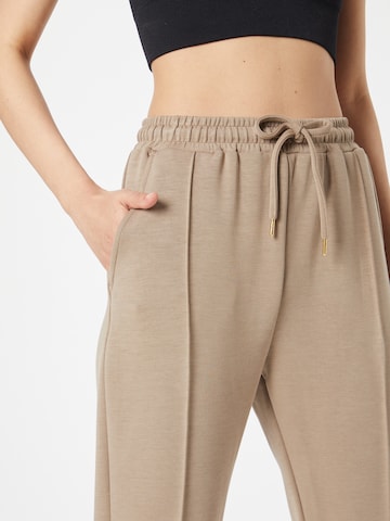 Athlecia Skinny Workout Pants 'Jacey' in Brown