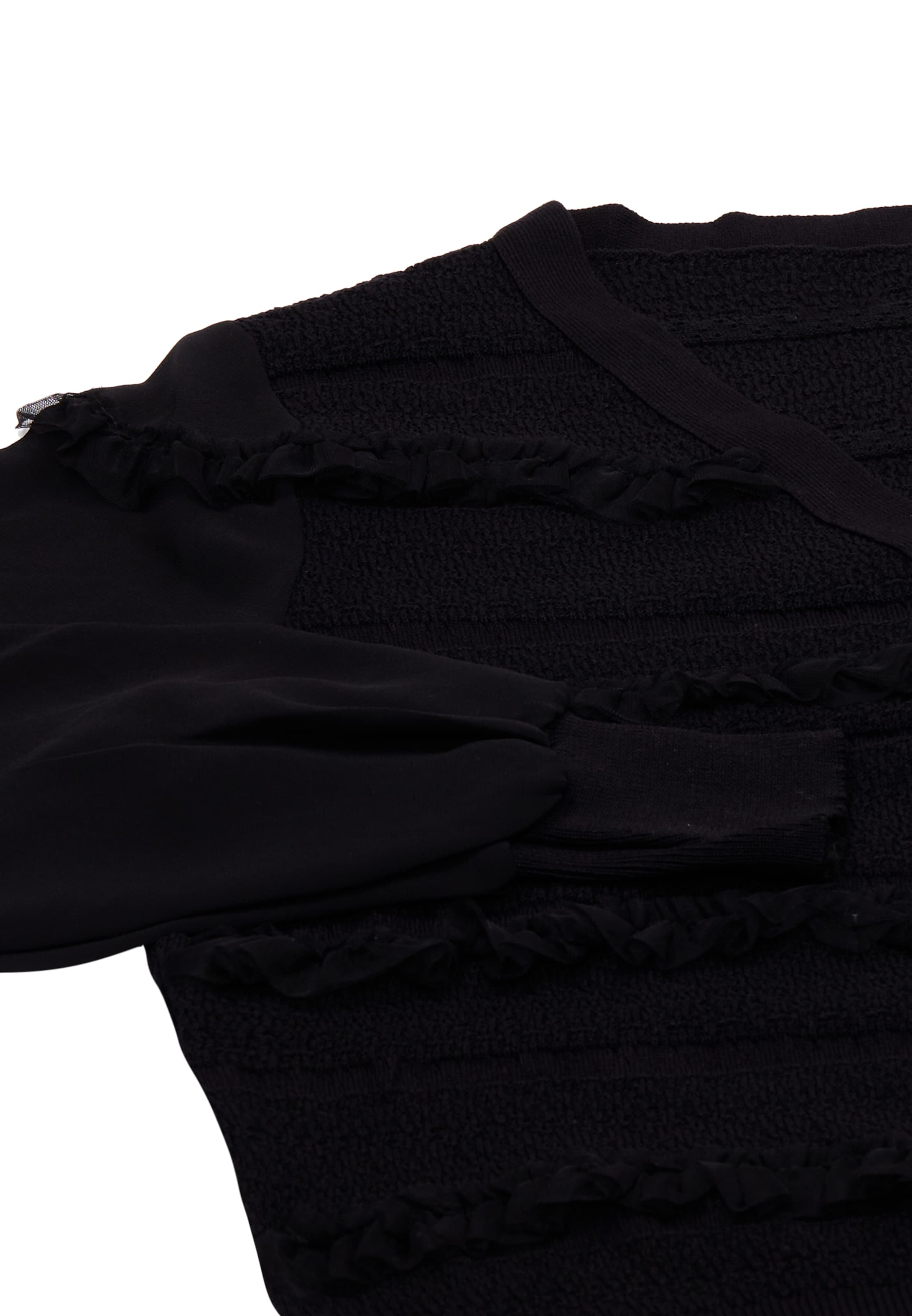 carato Knit cardigan in Black