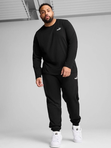 PUMA Shirt‌‌‌‌‌‌‌‌‌ in Schwarz