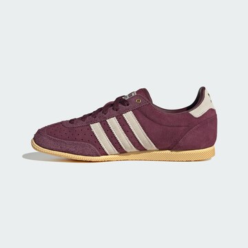 Baskets basses ADIDAS ORIGINALS en rouge