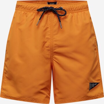 Shorts de bain Superdry en orange : devant