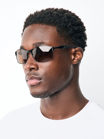 Lunettes de soleil Next en noir
