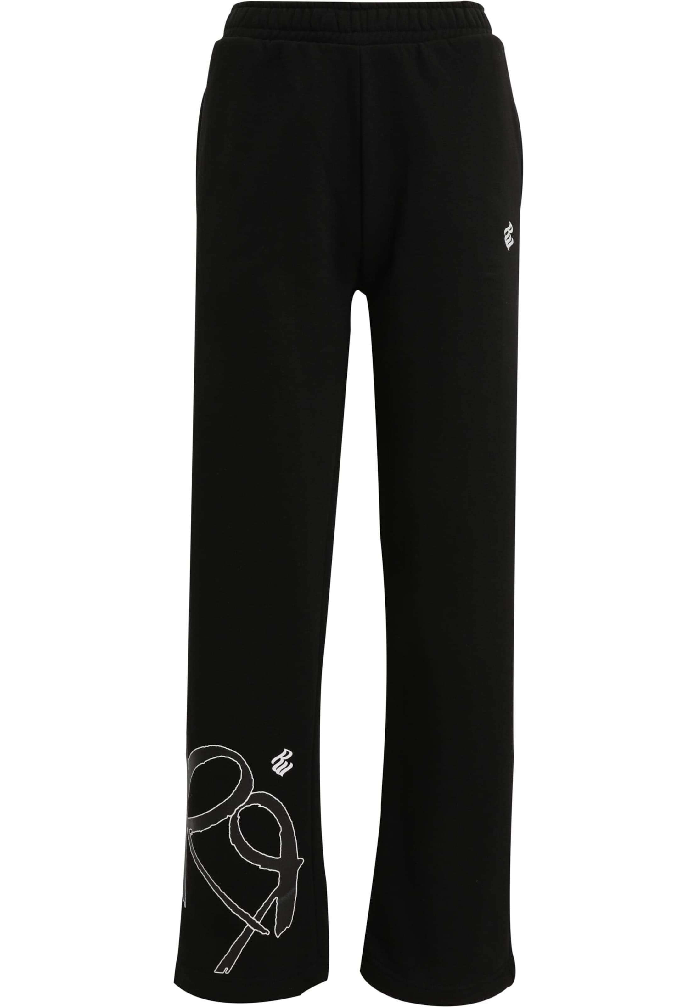 ROCAWEAR Loose fit Trousers in Black: front