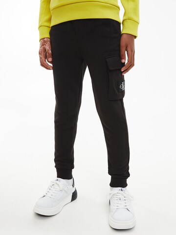 Calvin Klein Jeans Tapered Pants in Black: front