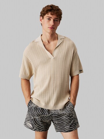 T-Shirt Calvin Klein Swimwear en beige : devant