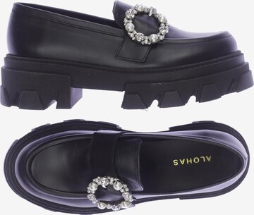 Alohas Flats & Loafers in 39 in Black: front