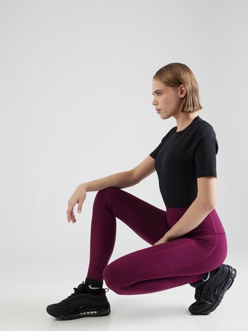 NIKE Skinny Fit Спортен панталон 'UNIVERSA' в розово