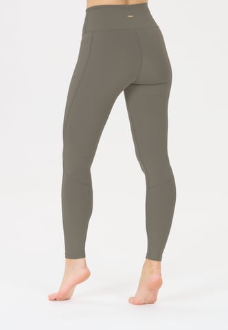 Athlecia Skinny Sportbroek 'Aliya' in Groen