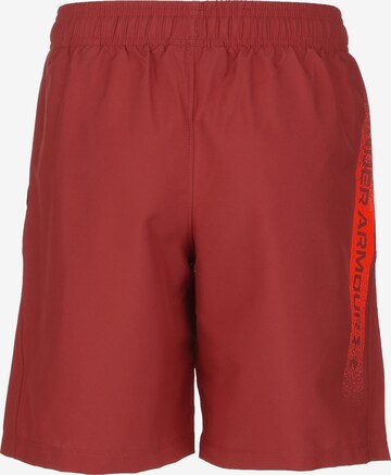 Regular Pantalon de sport UNDER ARMOUR en rouge