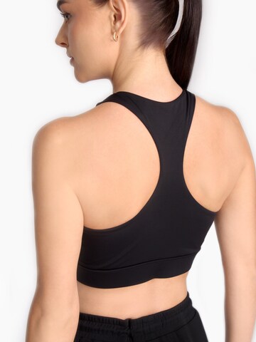 Cardio Bunny Biustonosz sportowy 'REFLECTIVE MOLDED CUP SPORTS BRA' w kolorze czarny