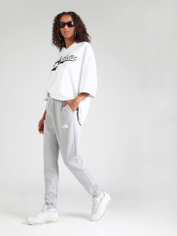 THE NORTH FACE Дънки Tapered Leg Панталон 'SIMPLE DOME' в сиво