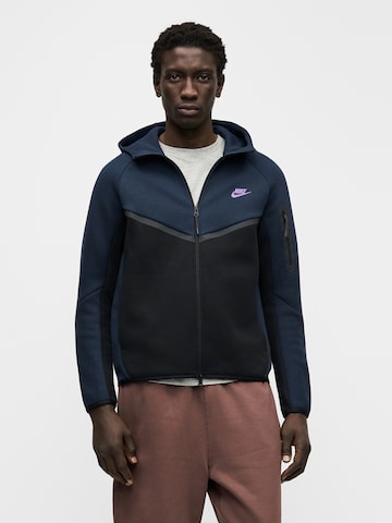 Veste de survêtement 'TCH FLC' Nike Sportswear en noir : devant