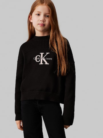 Pull-over Calvin Klein Jeans en noir : devant