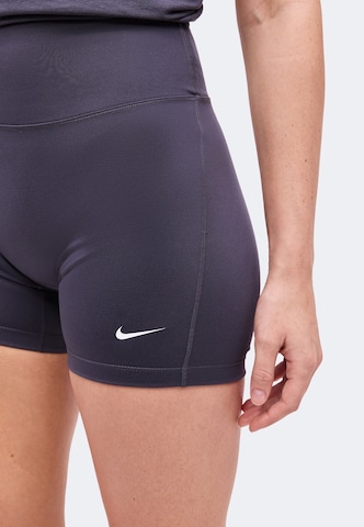 Skinny Pantaloni sport 'ONE' de la NIKE pe albastru