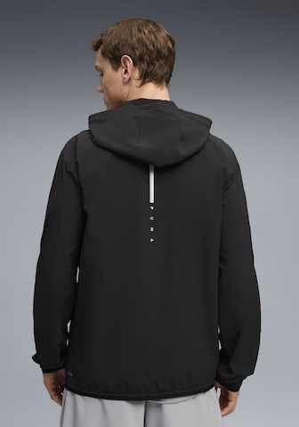 PUMA Trainingsjacke in Schwarz: Vorderseite