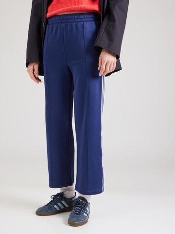 Champion Authentic Athletic Apparel Loose fit Trousers in Blue: front
