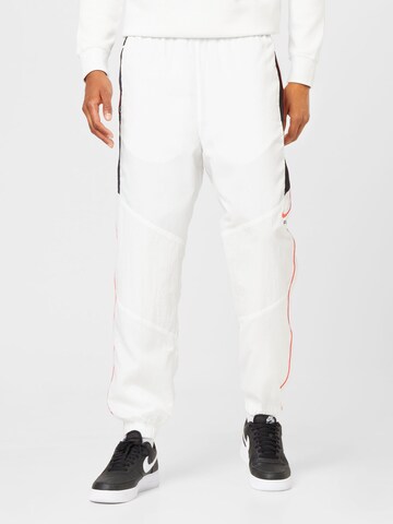 balta Nike Sportswear Siaurėjantis Kelnės 'Air': priekis