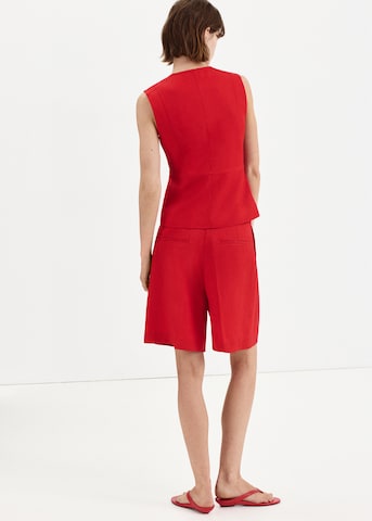 Wide leg Pantaloni con pieghe 'AVOCADO' di MANGO in rosso