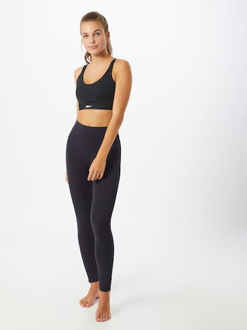 CURARE Yogawear Skinny Športové nohavice - Modrá