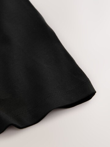 Tricou de la smALLSAINTS pe negru