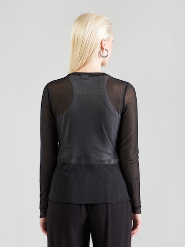 Tricou 'JINNIE' de la NÜMPH pe negru