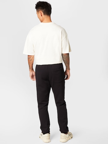 9N1M SENSE Regular Pants in Black