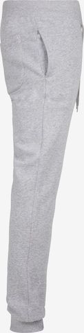 Tapered Pantaloni di Urban Classics in grigio