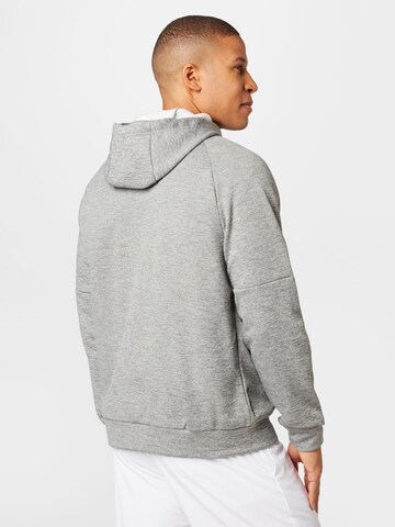 NIKE Sportsweatjacke in Grau