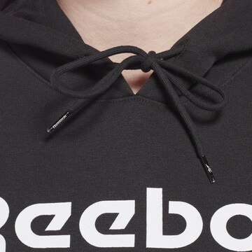 Reebok - Sudadera en negro