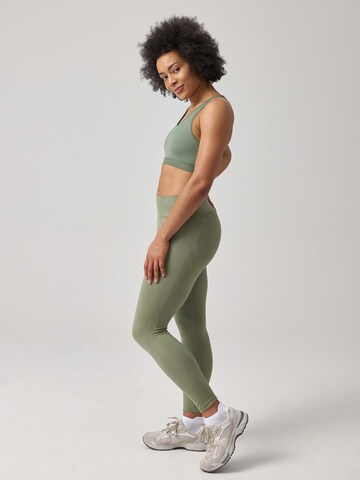 SNOCKS Skinny Sportbroek 'Seamless' in Groen