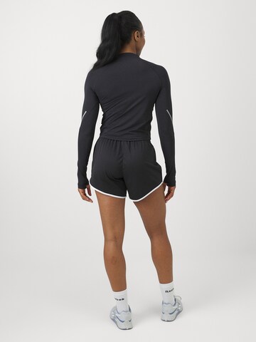 Reebok Regular Workout Pants in Black