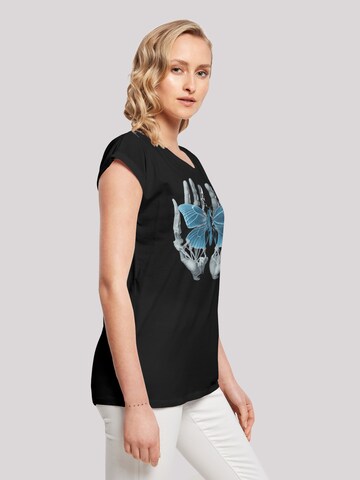 T-shirt 'Skelett Hände Schmetterling' F4NT4STIC en noir