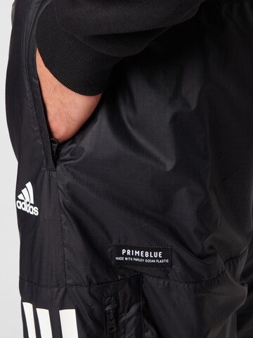 ADIDAS SPORTSWEAR Tapered Sports trousers in Black