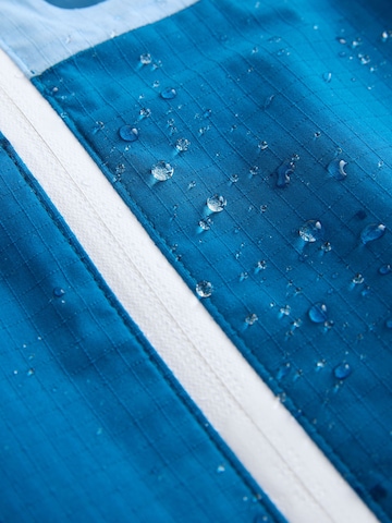 Next Övergångsjacka i blå