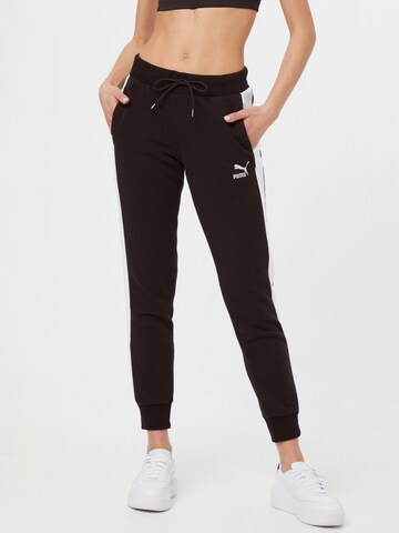 PUMA Tapered Workout Pants 'Iconic T7' in Black: front