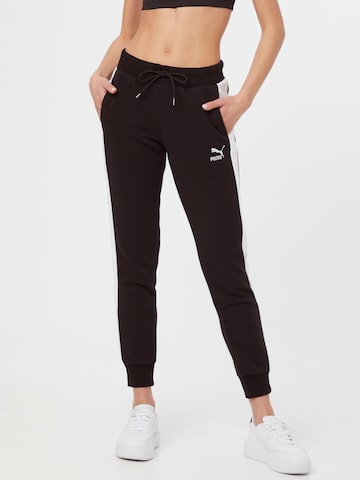 PUMA - Tapered Pantalón deportivo 'Iconic T7' en negro: frente