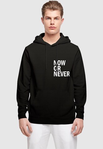 Sweat-shirt 'Now Or Never' Merchcode en noir : devant