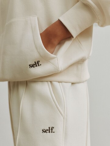 Sweat-shirt self. en beige
