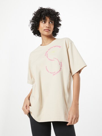 ADIDAS BY STELLA MCCARTNEY - Camiseta funcional en beige: frente