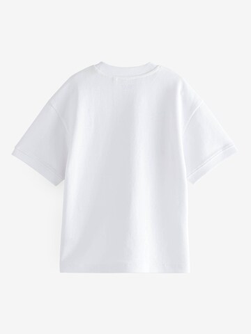 T-Shirt Next en blanc