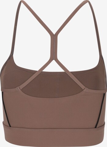 Athlecia Low Support Sports Bra 'Brastine' in Brown