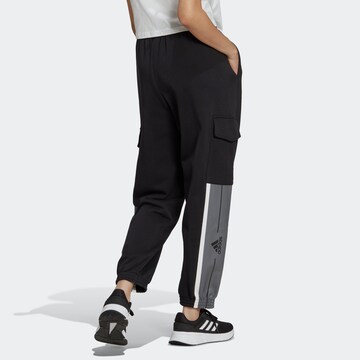 ADIDAS SPORTSWEAR Loose fit Sports trousers 'Essentials Pin Stripe Block Fleece ' in Black