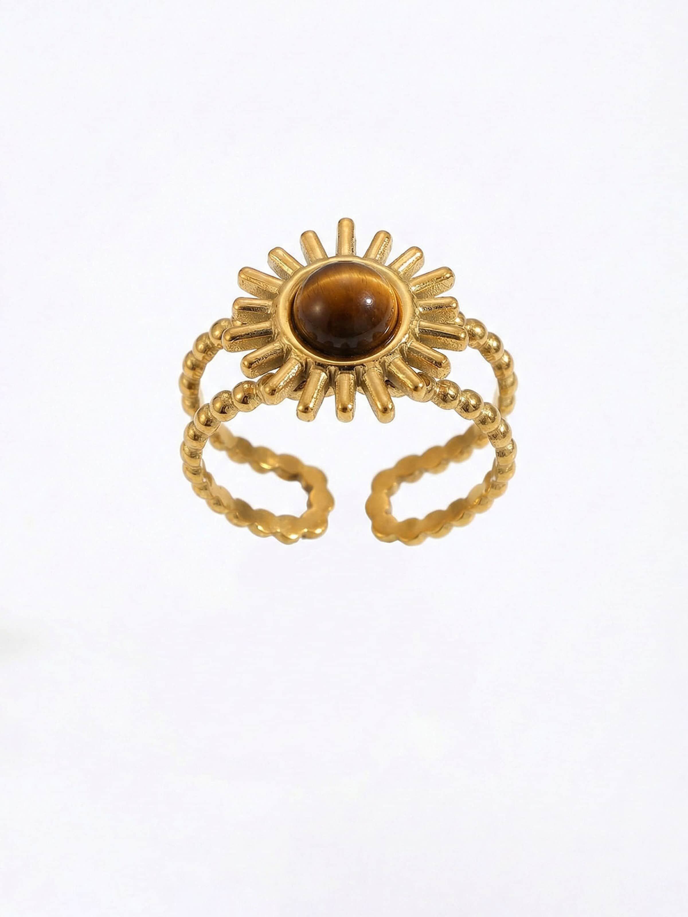 Nemomatheo Ring 'Sunburst' in Brown: front