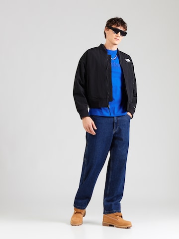 TIMBERLAND Majica 'ESTABLISHED 1973' | modra barva
