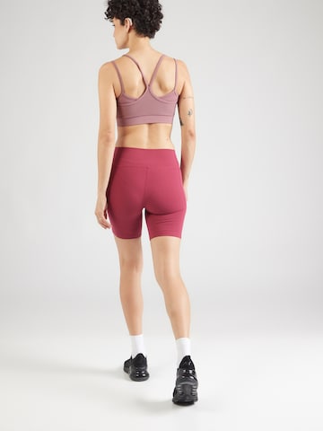 UNDER ARMOUR - Skinny Pantalón deportivo 'Motion' en rojo