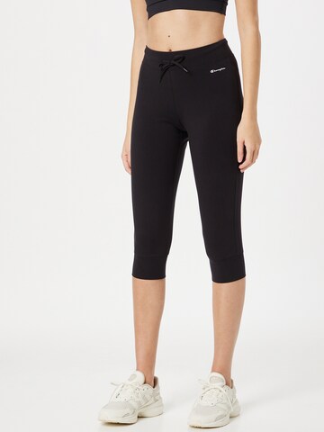 Effilé Pantalon de sport Champion Authentic Athletic Apparel en noir : devant