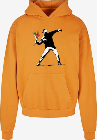 Merchcode Sweatshirt 'Banksy - Love Is In The Air' in Orange: Vorderseite