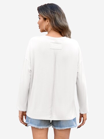 Tricou de la Imily Bela pe alb: spate