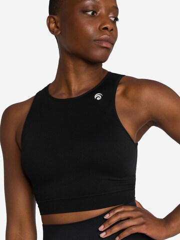 OCEANSAPART Sports Top 'Power' in Black